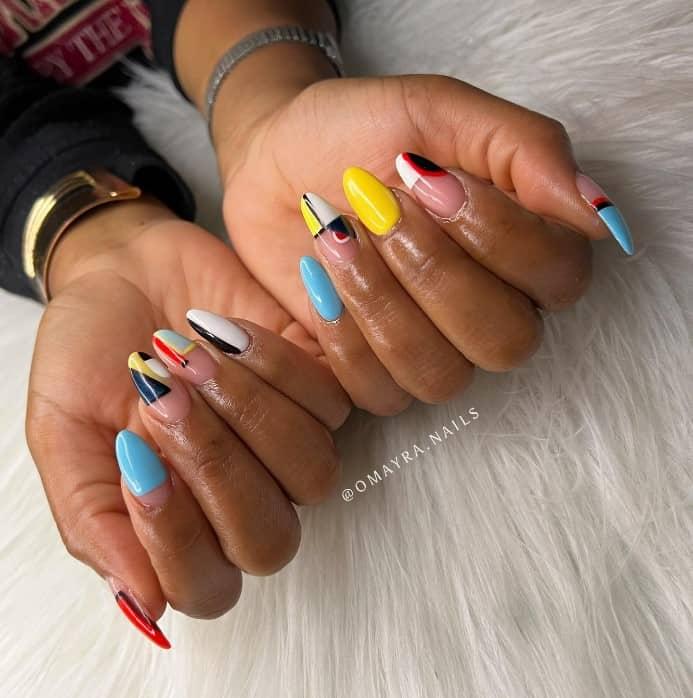 Combine yellow and blue nails with sublime nail art inspired by Piet Mondrian's abstract work