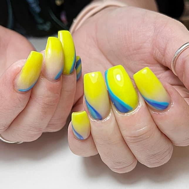 a woman with gradient design and a sleek glossy finish nail polish