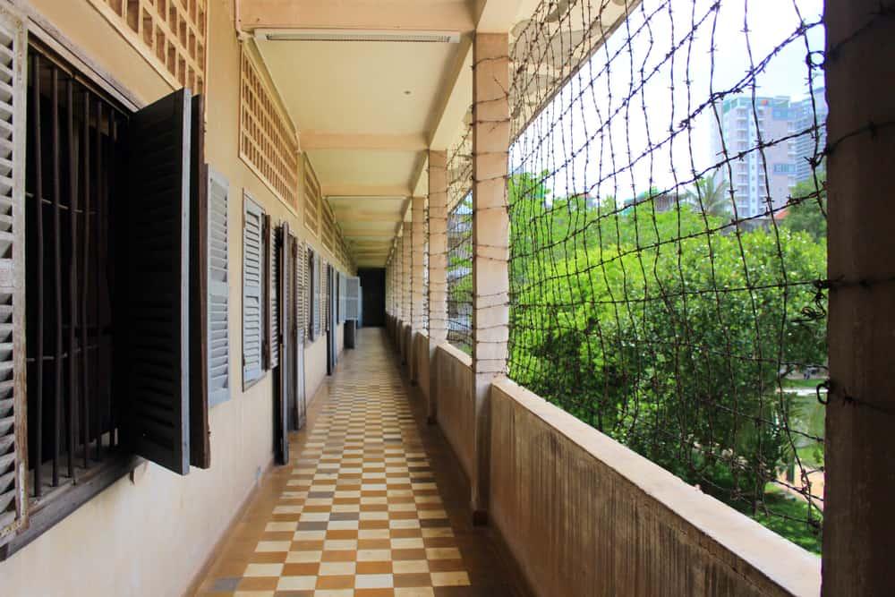 Panorama of classroom converted to prison at the Tuol Sleng Genocide Museum, formerly S21 school used as detention and torture center by the Khmer Rouge, in Phnom Penh Cambodia