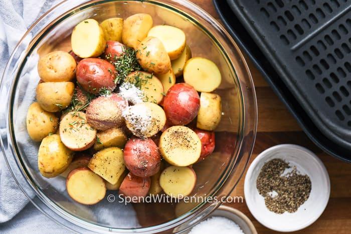 Air fryer potatoes ingredients in a bowl