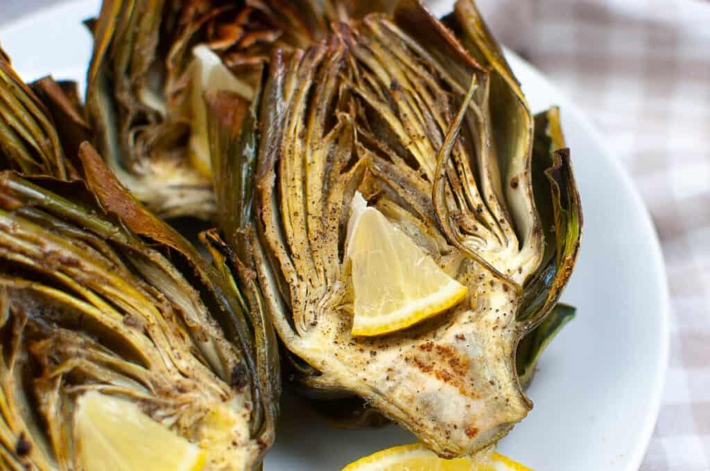Low angle shot of air-fried artichokes ready to eat.