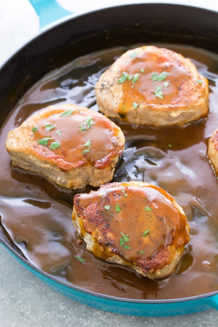Pan seared pork chops with honey mustard sauce. These easy skillet pork chops are one of our favorite pork chop recipes!