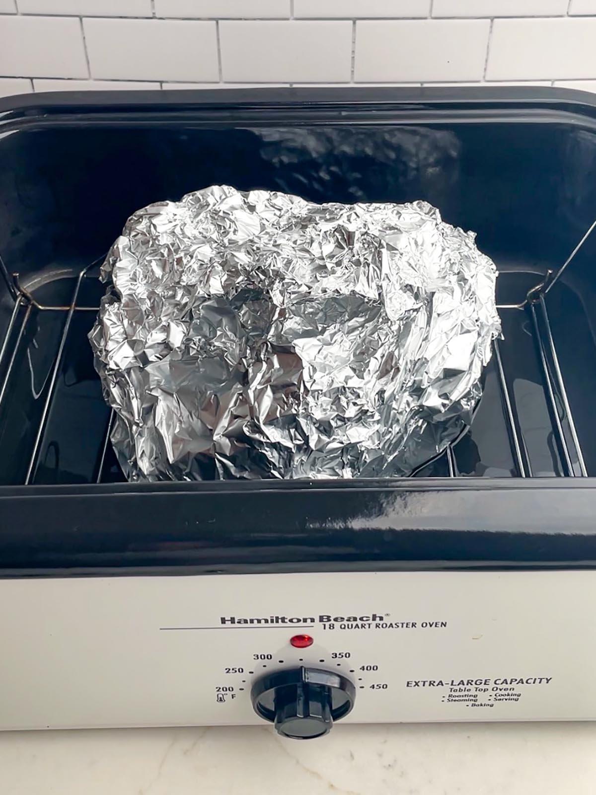 roaster oven ham in foil in roaster oven