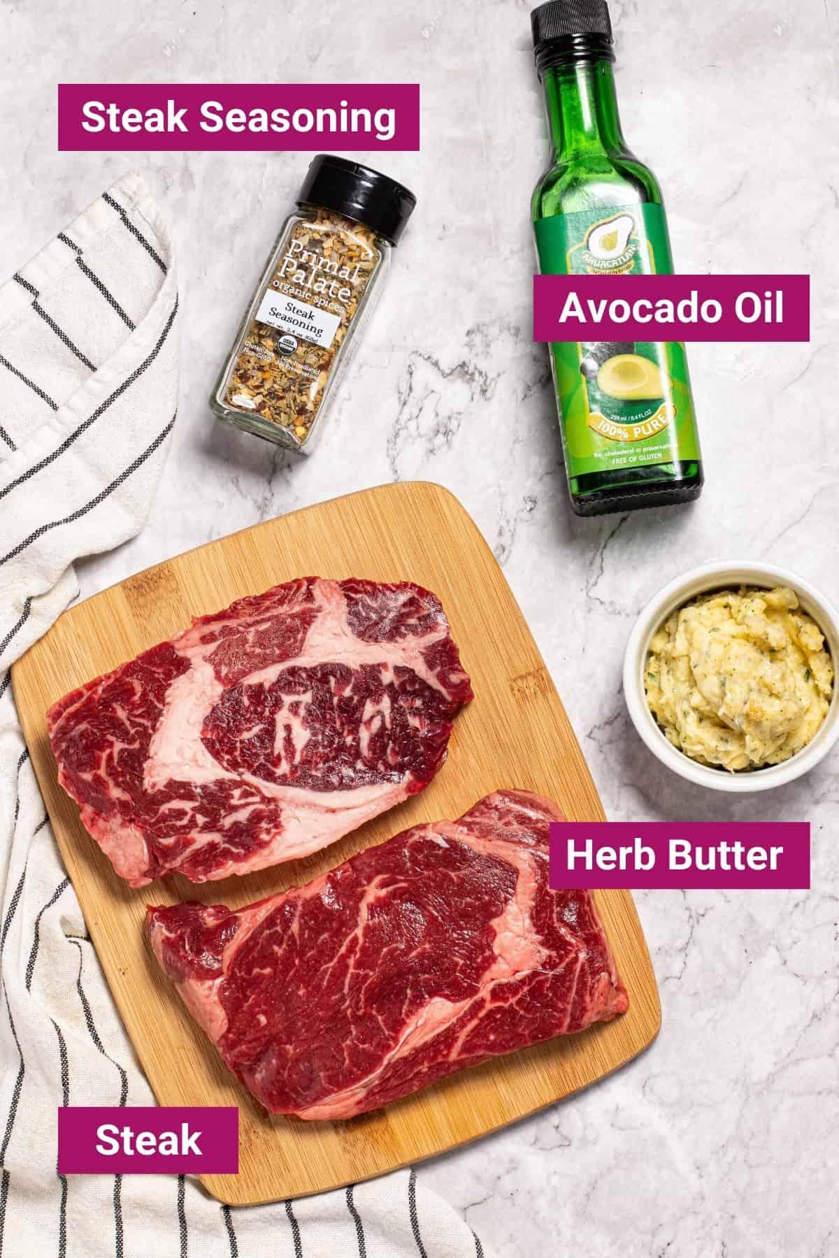 ingredients needed to cook steak in an air fryer like steak seasoning, avocado oil, ribeye steak, and garlic butter for steak