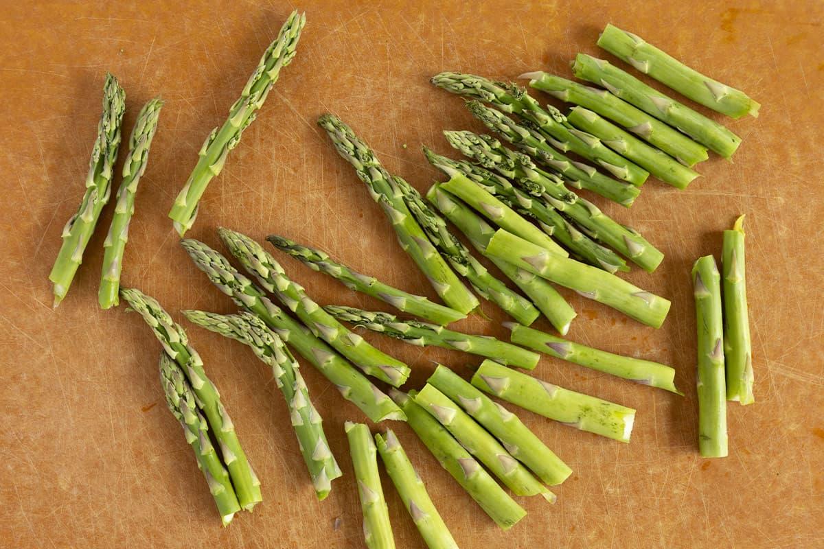 cut pieces of asparagus in frying pan for asparagus baby food