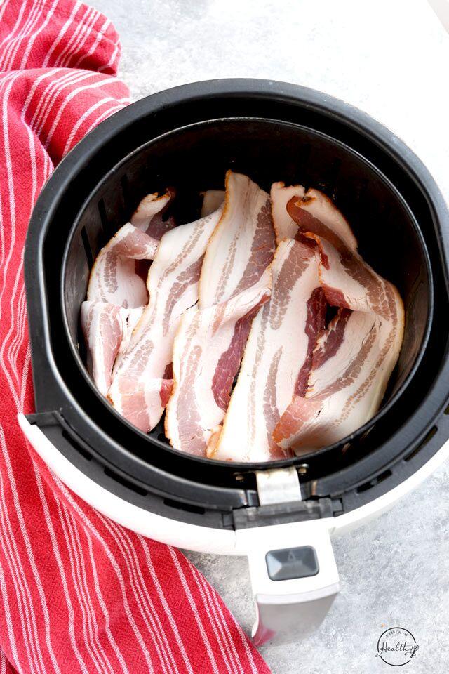 Cooked bacon in the air fryer basket
