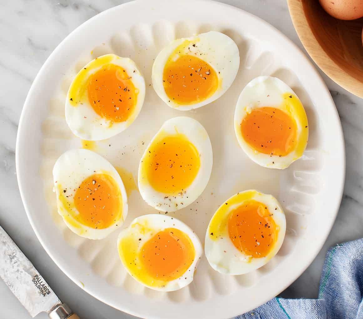 Perfect soft boiled eggs on a plate