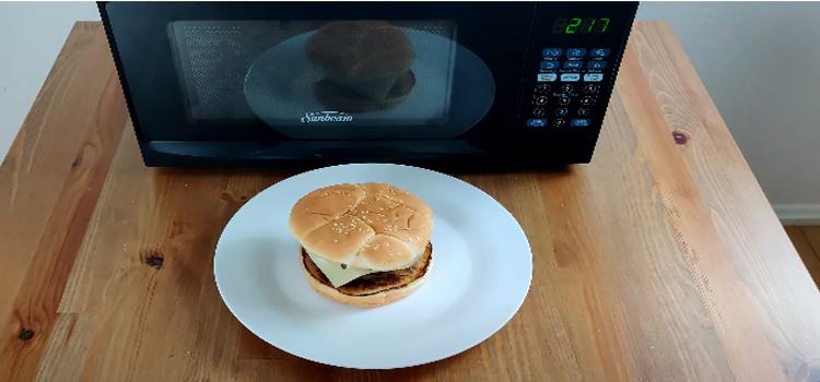 burger and a microwave on a wooden table