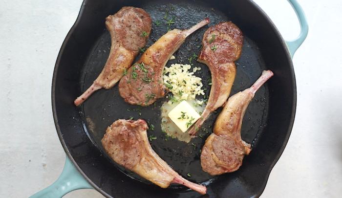 Lay the chops flat inside of the skillet
