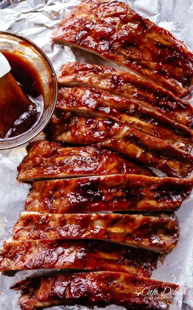 Crock Pot Ribs slathered in the most delicious sticky barbecue sauce with a kick of garlic and optional heat! Juicy melt-in-your-mouth oven baked Barbecue Pork Ribs are fall-off-the-bone delicious! Double up on incredible flavor with an easy to make dry rub first, then coat them in a seasoned barbecue sauce mixture so addictive you won.