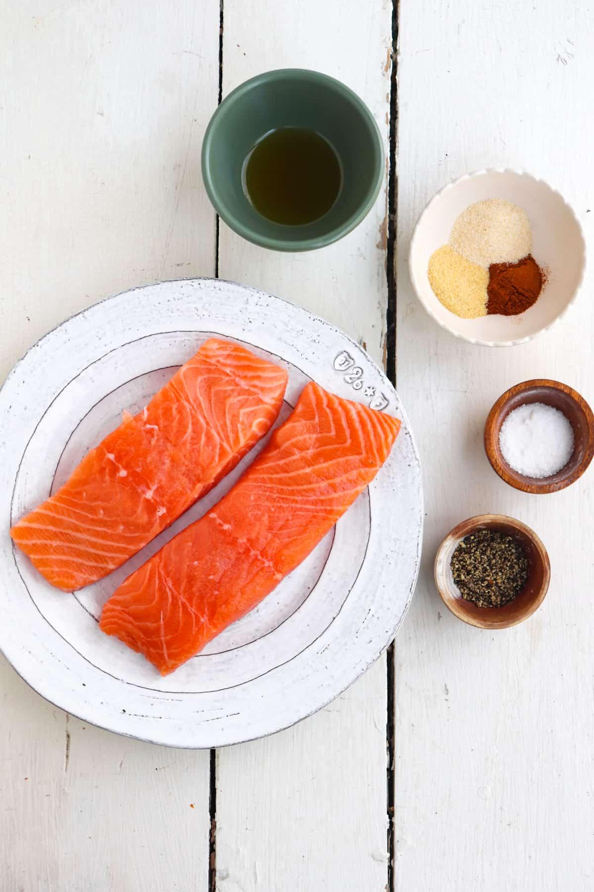 ingredients for ninja foodi salmon on a white background.