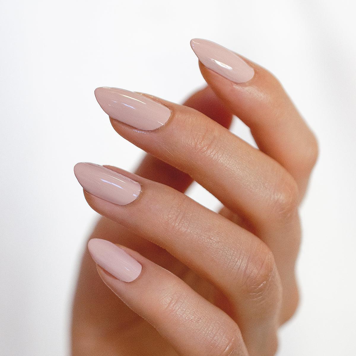 almond shape nails with nude nail polish