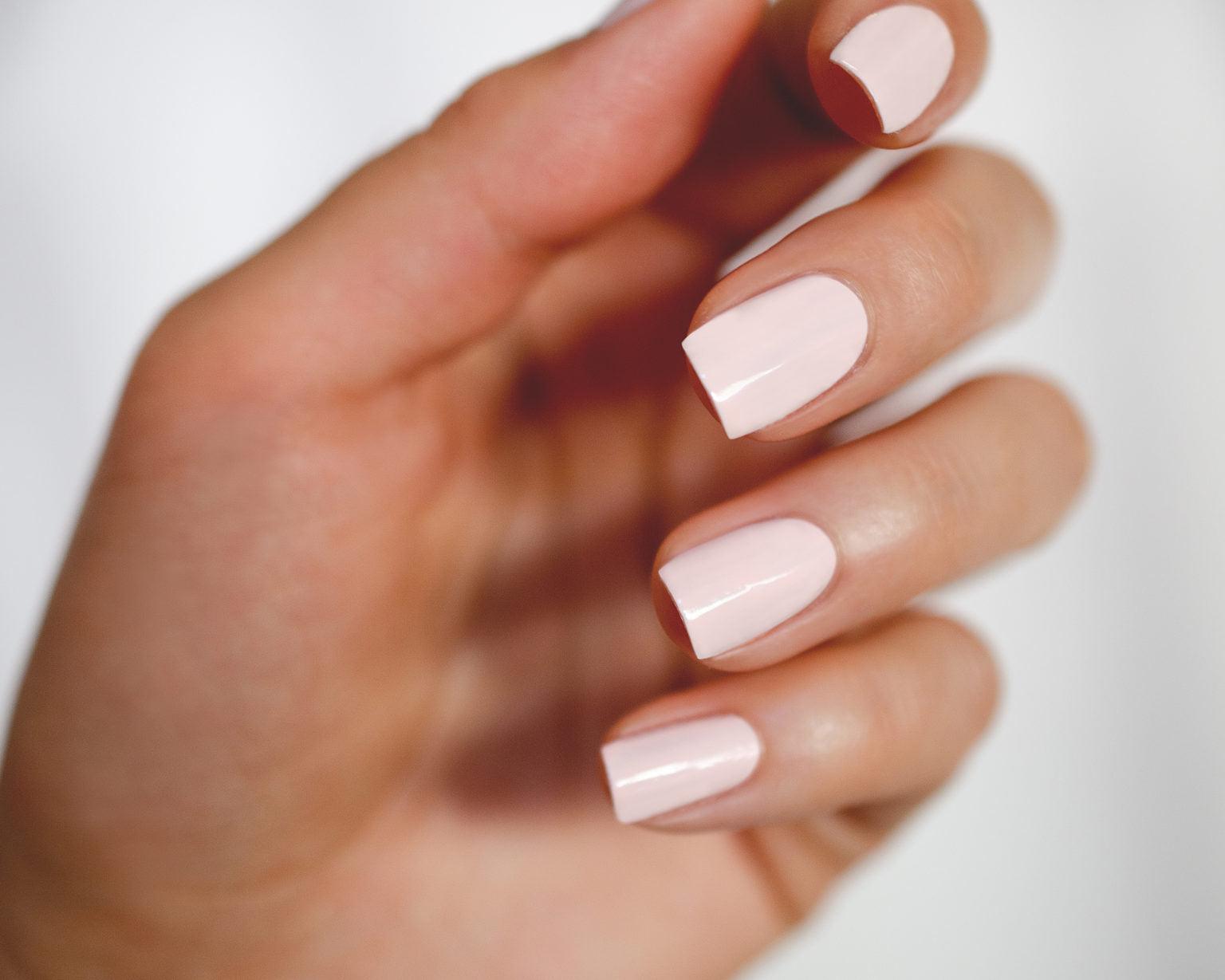 square nail shape with light pink nail polish