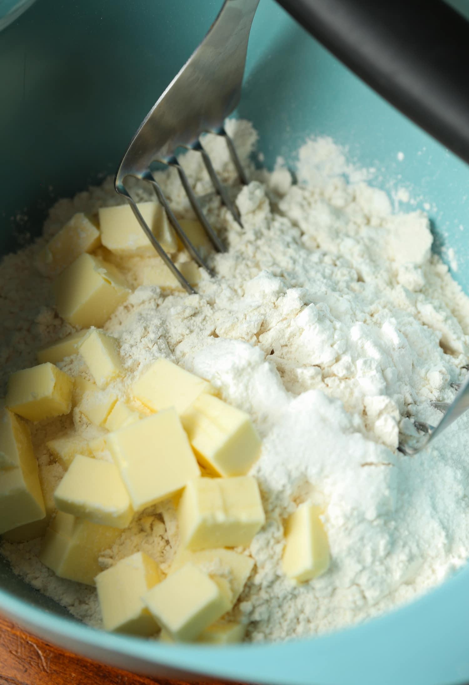 Cutting butter into dry ingredients for biscuits