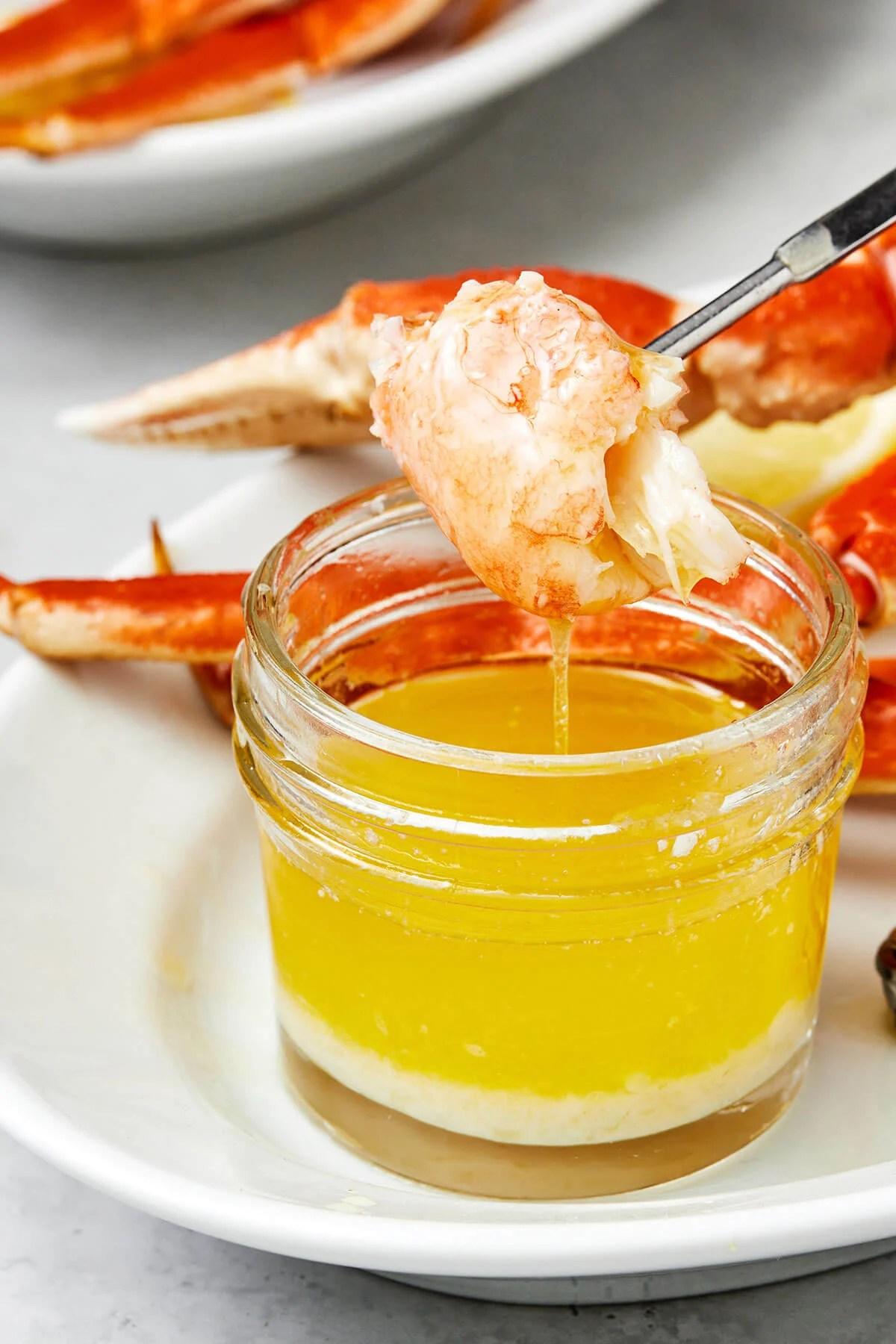 Dipping crab in butter sauce