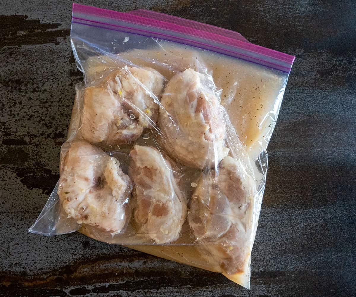zip-top bag with turkey tails in vinegar.