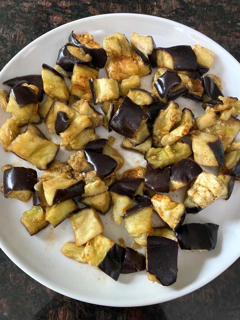 chopped, cooked eggplant on a plate