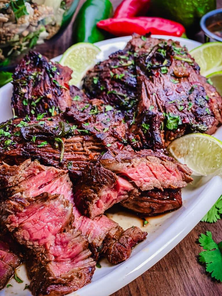 slices of medium rare beef on a platter