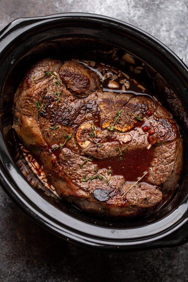roast in a slow cooker with braising liquid
