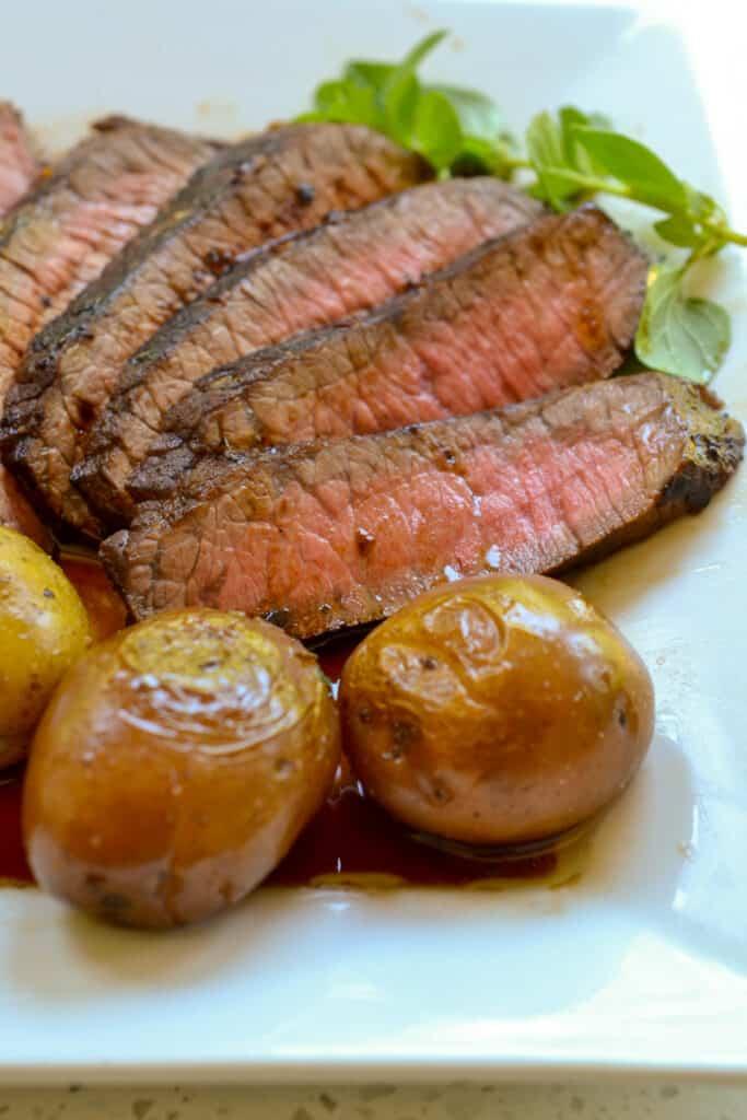 Easy Pan-Seared London Broil with baby gold potatoes.