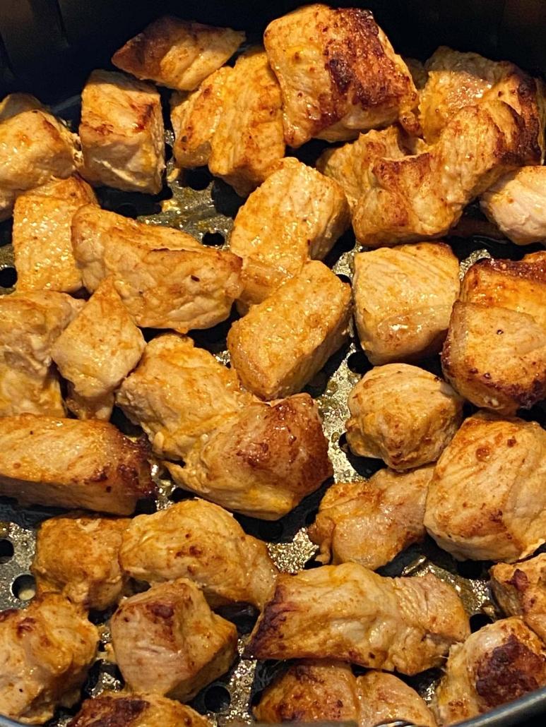close-up of pork bites in air fryer