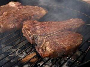grass-fed steak on grill