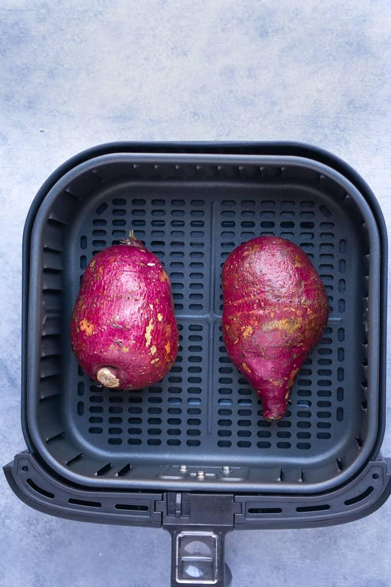 Step-by-step pictures of cooking Japanese sweet potatoes in the air fryer.