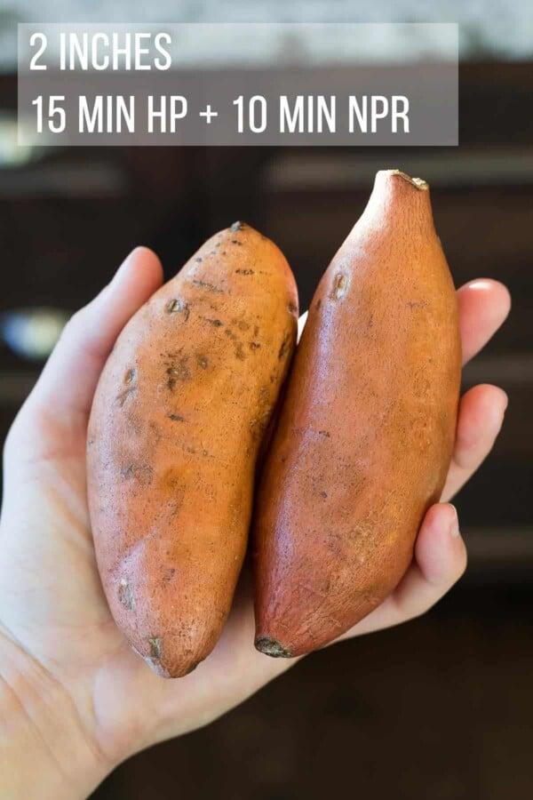 a hand holding two small sweet potatoes with the cook time indicated